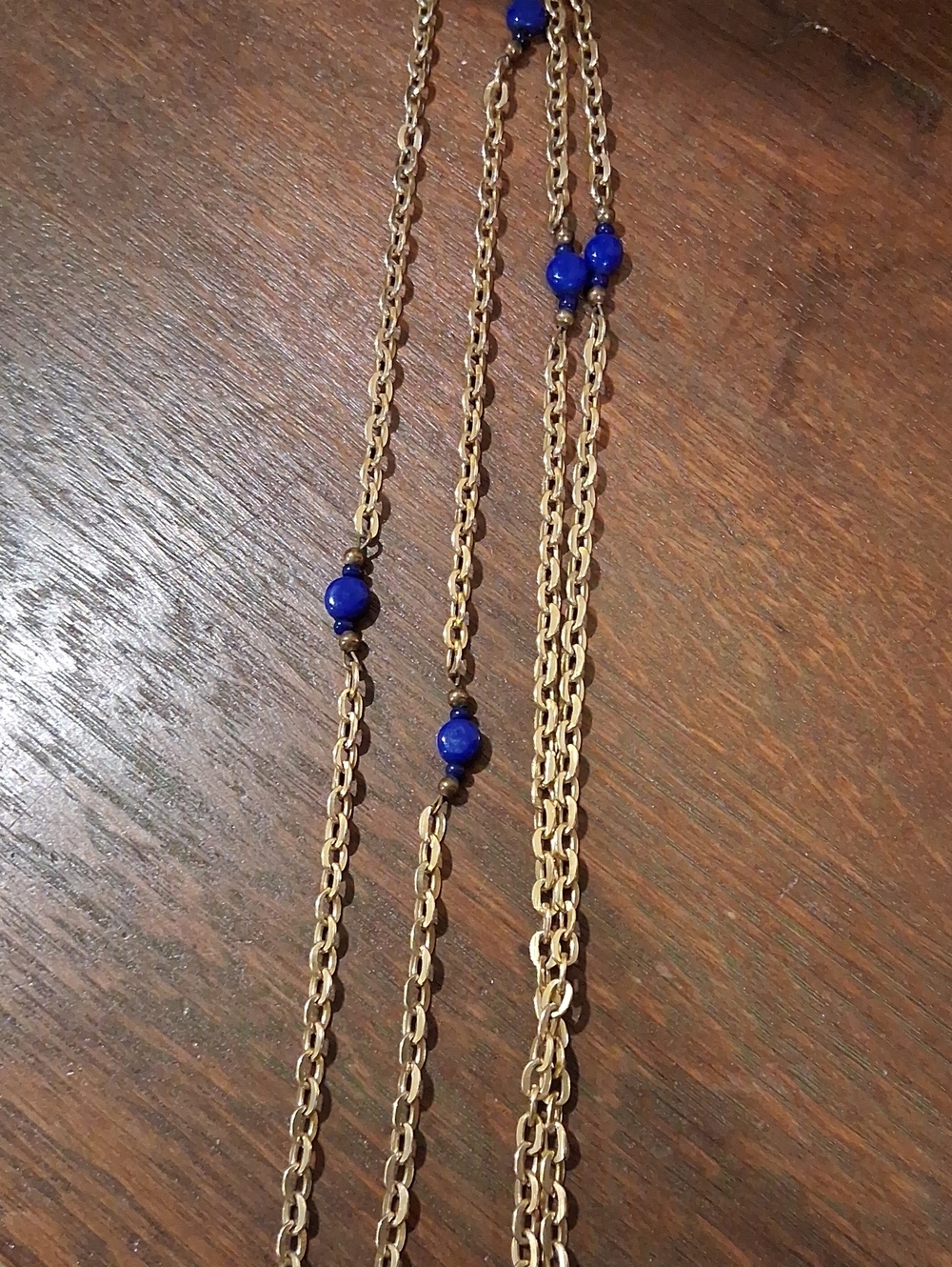Gold Tobe Chain Necklace with Blue Bead Accents